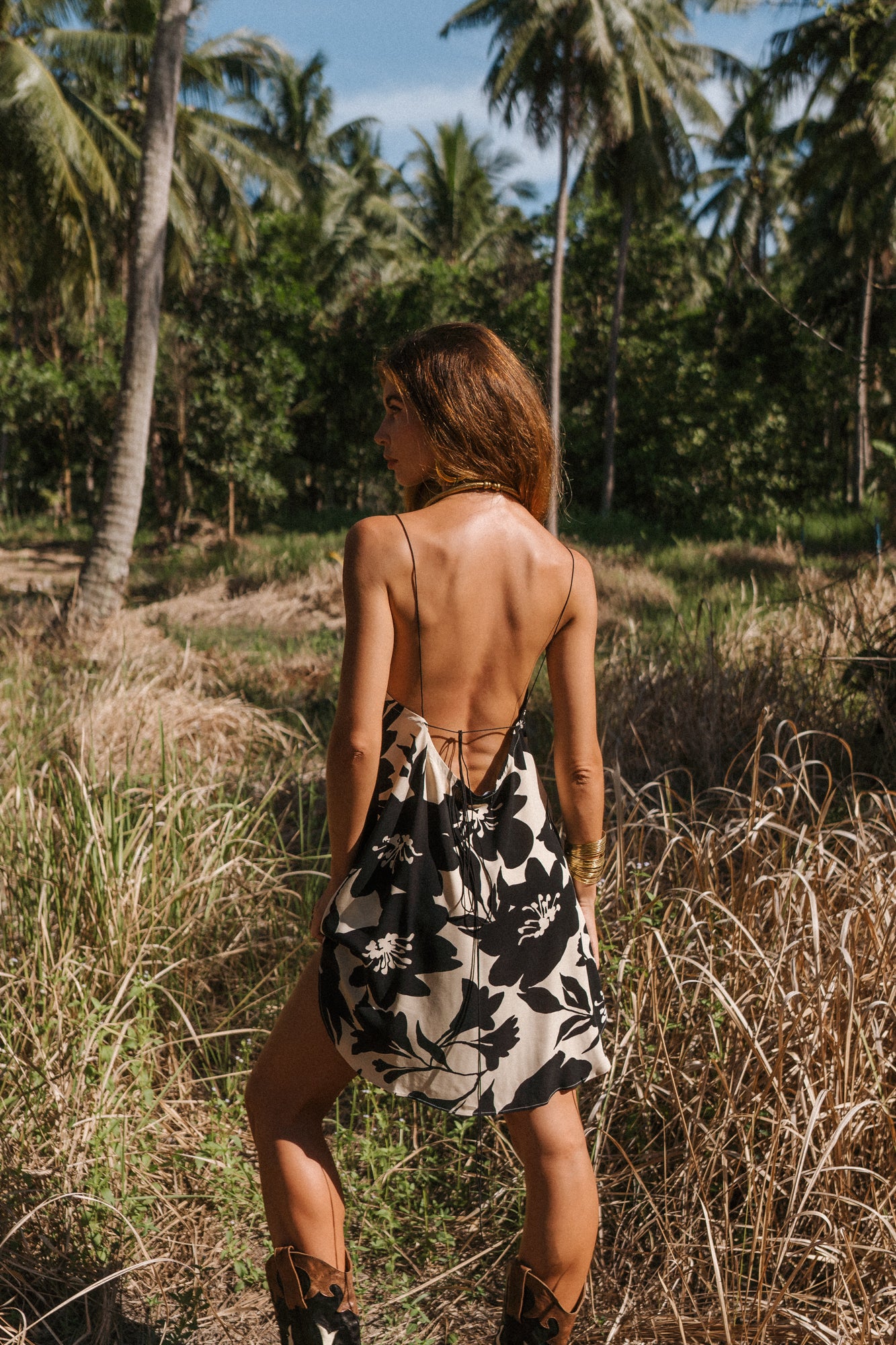 Women mini black slip dress with floral print