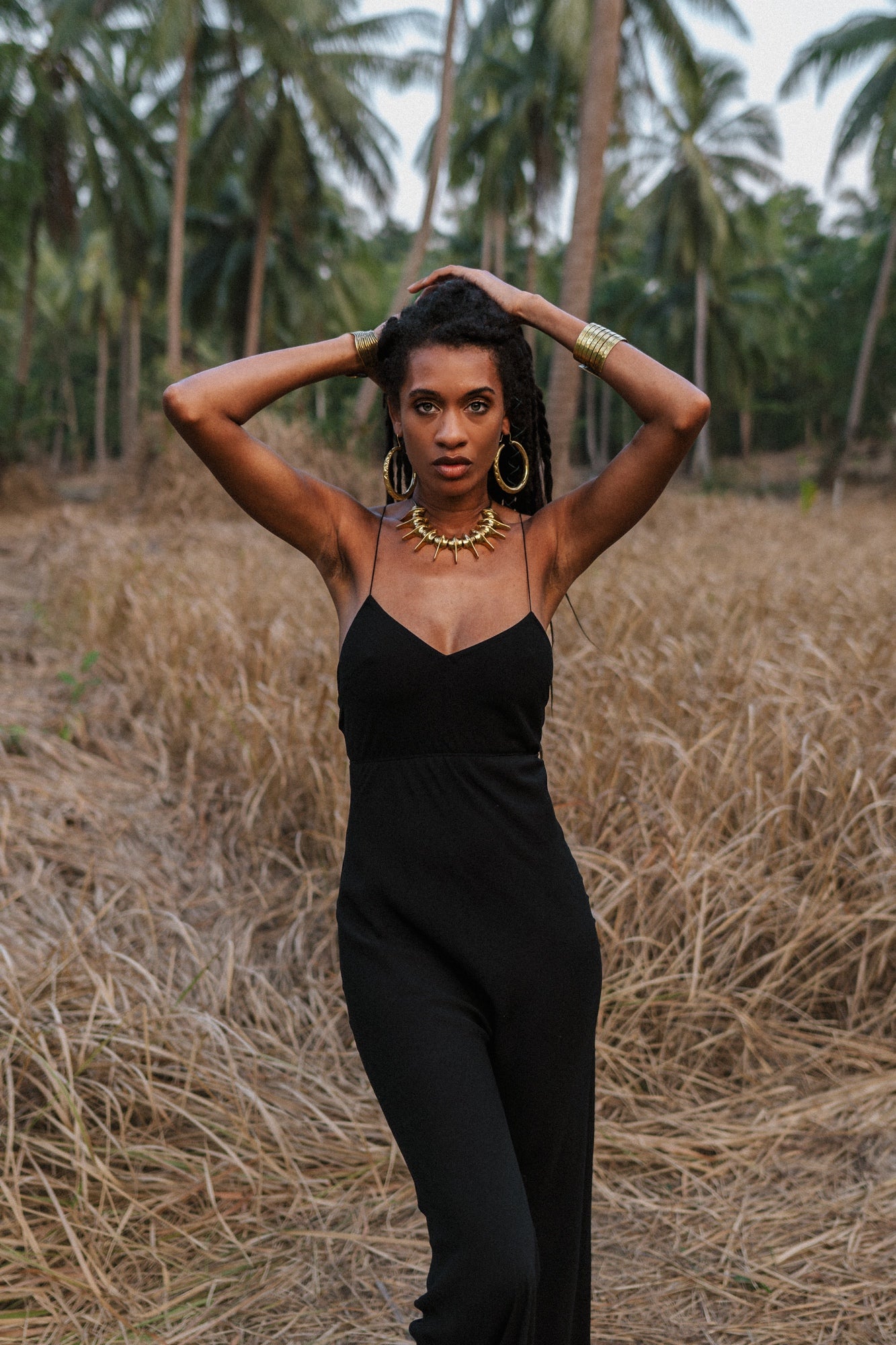 Women black jumpsuit with open back