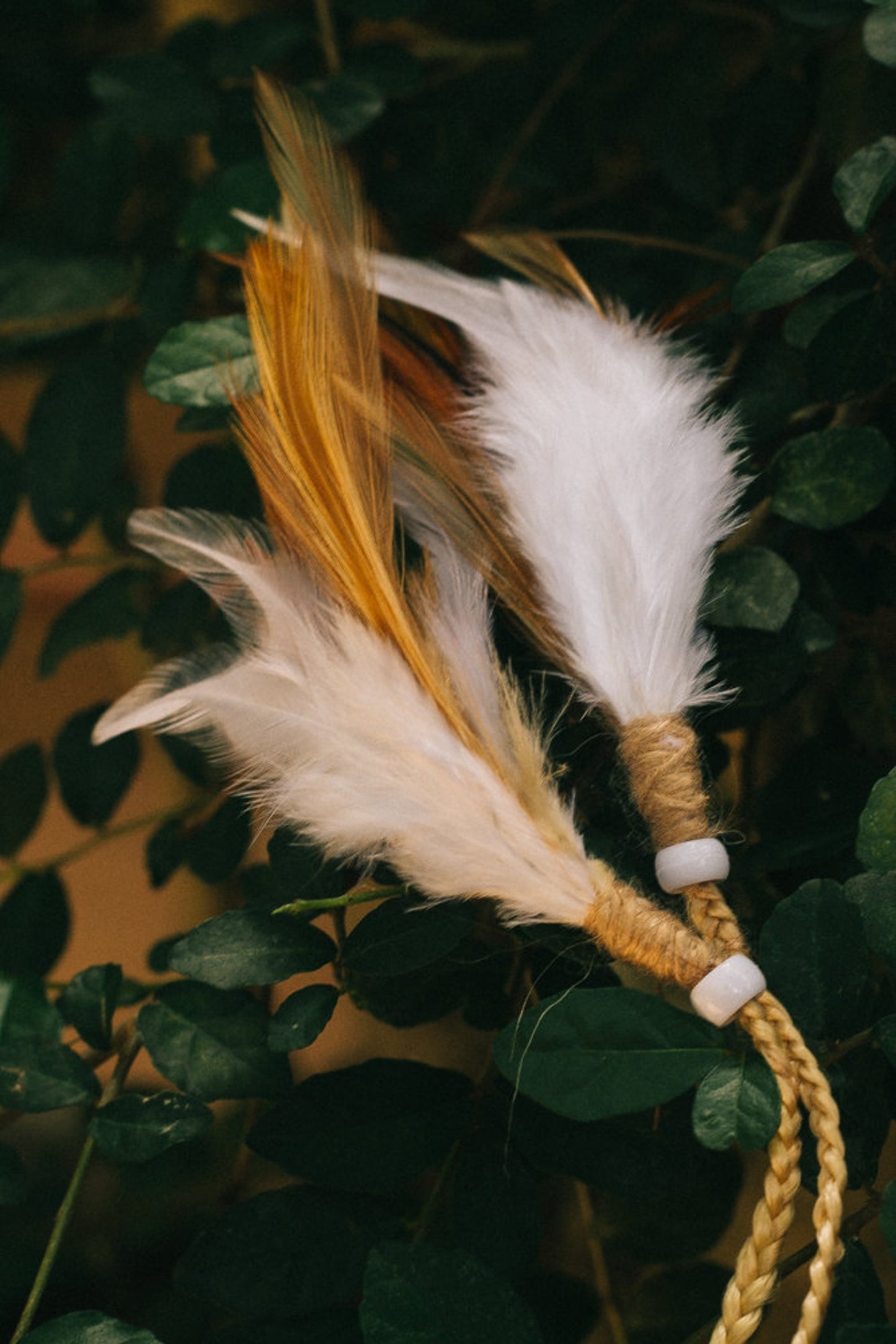 White headpiece with soft feathers