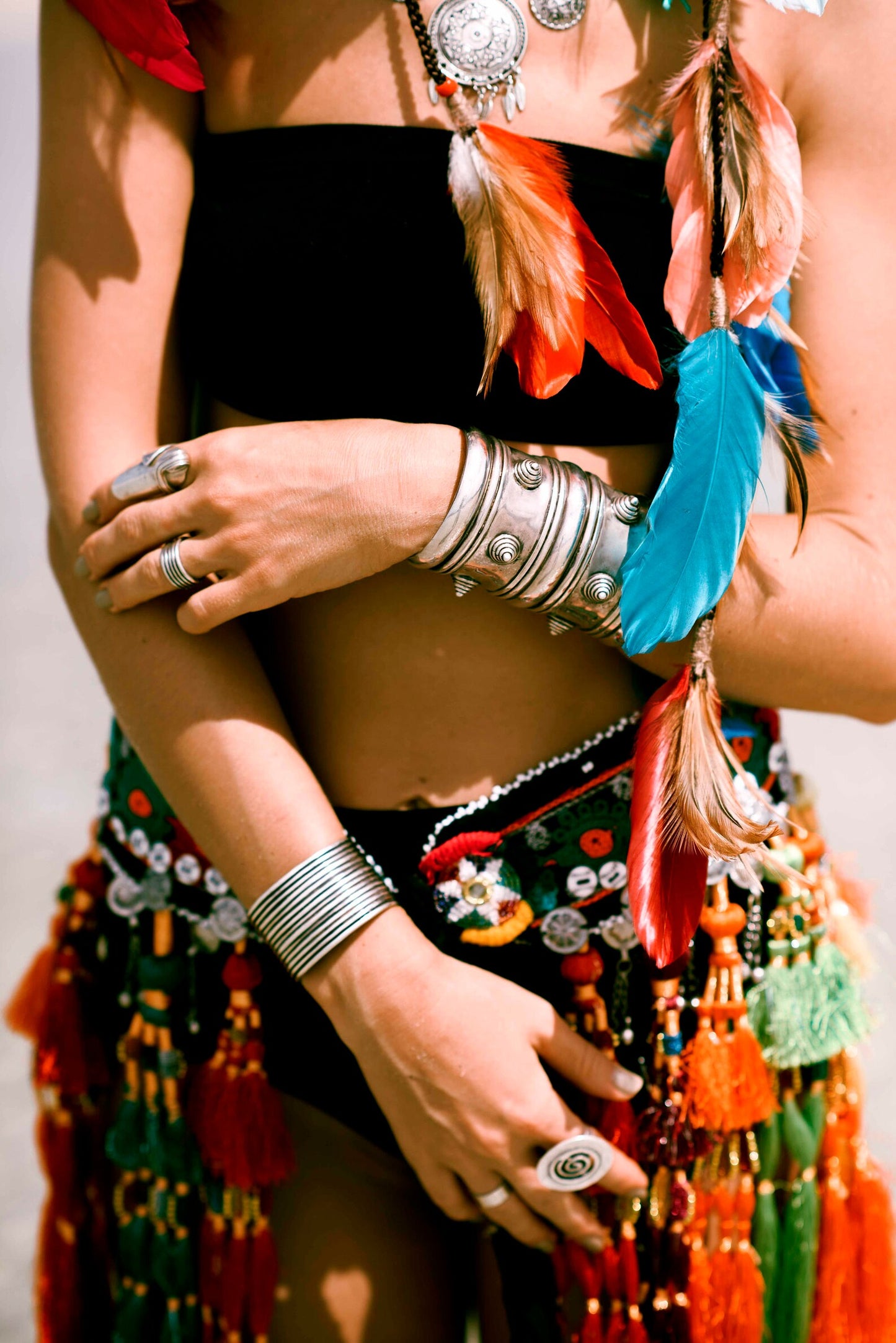 Multi colored headpiece with feathers