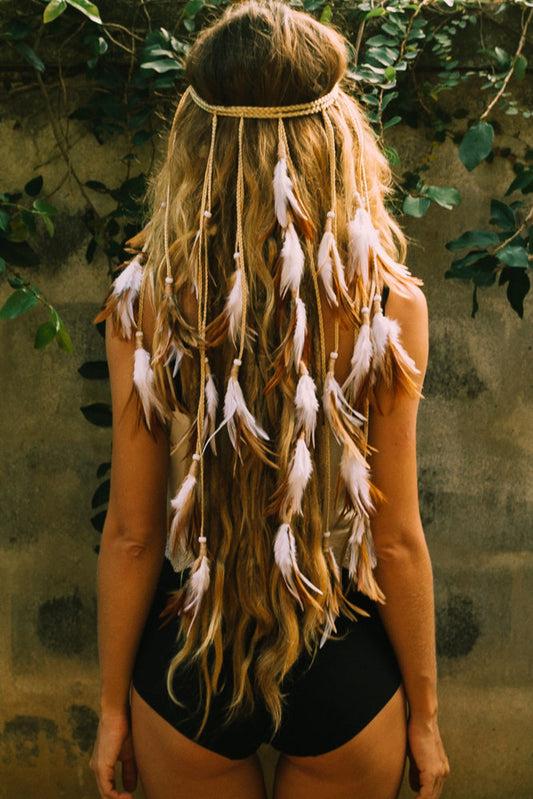 White headpiece with soft feathers