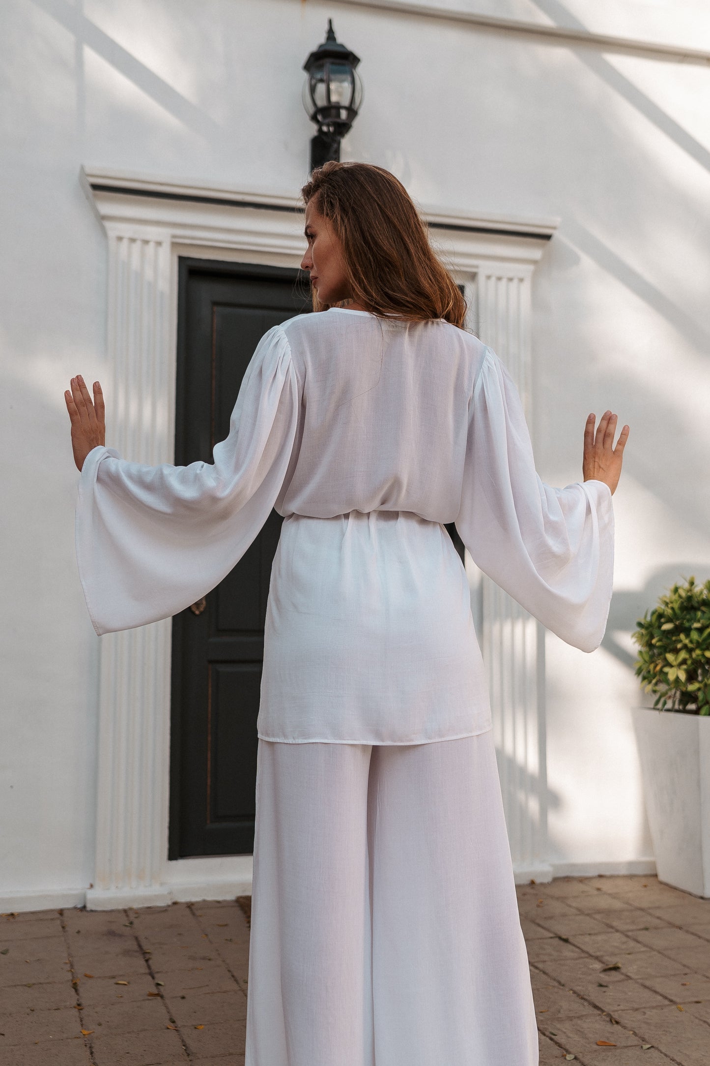 Women white pants and top