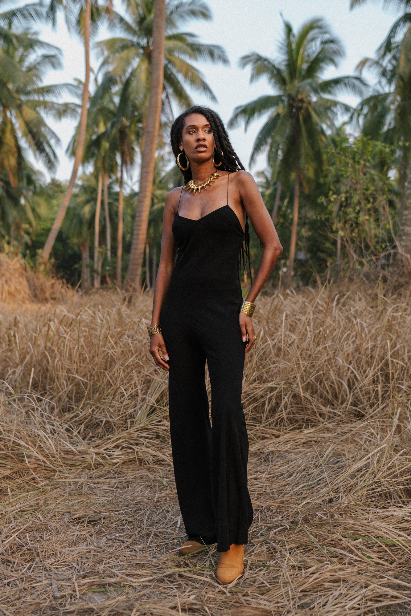 Women black jumpsuit with open back