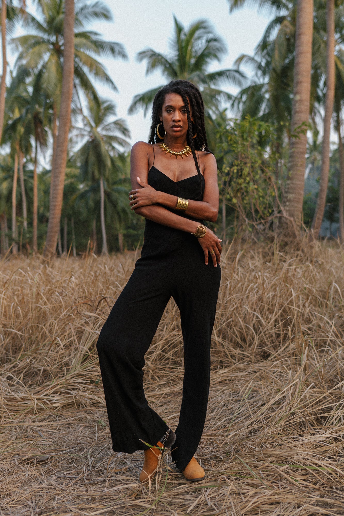 Women black jumpsuit with open back