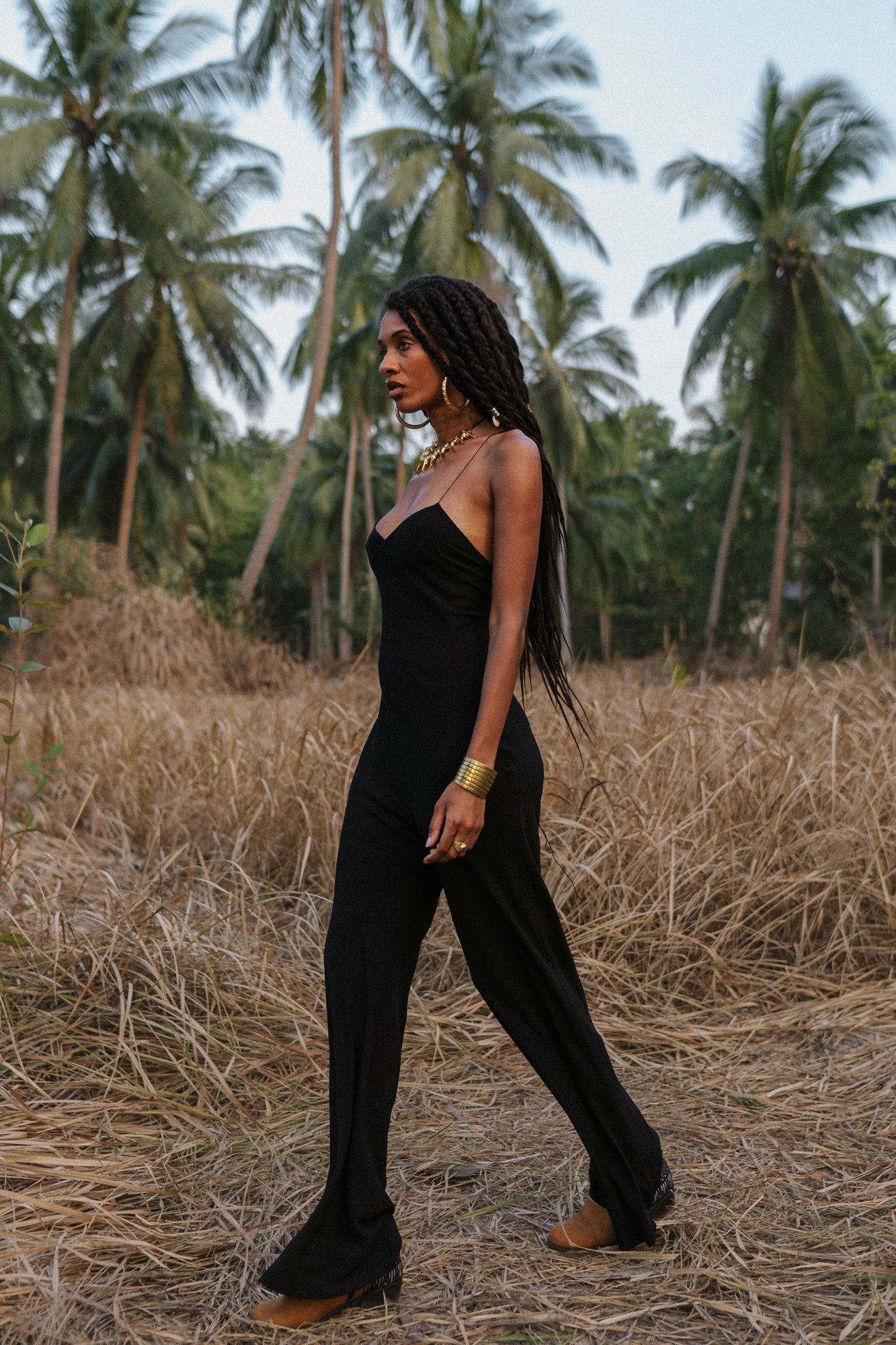 Women black jumpsuit with open back