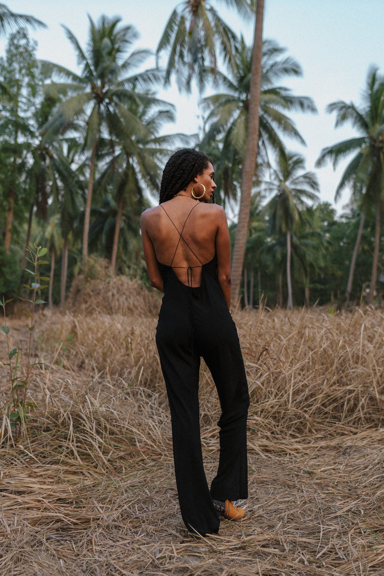 Women black jumpsuit with open back