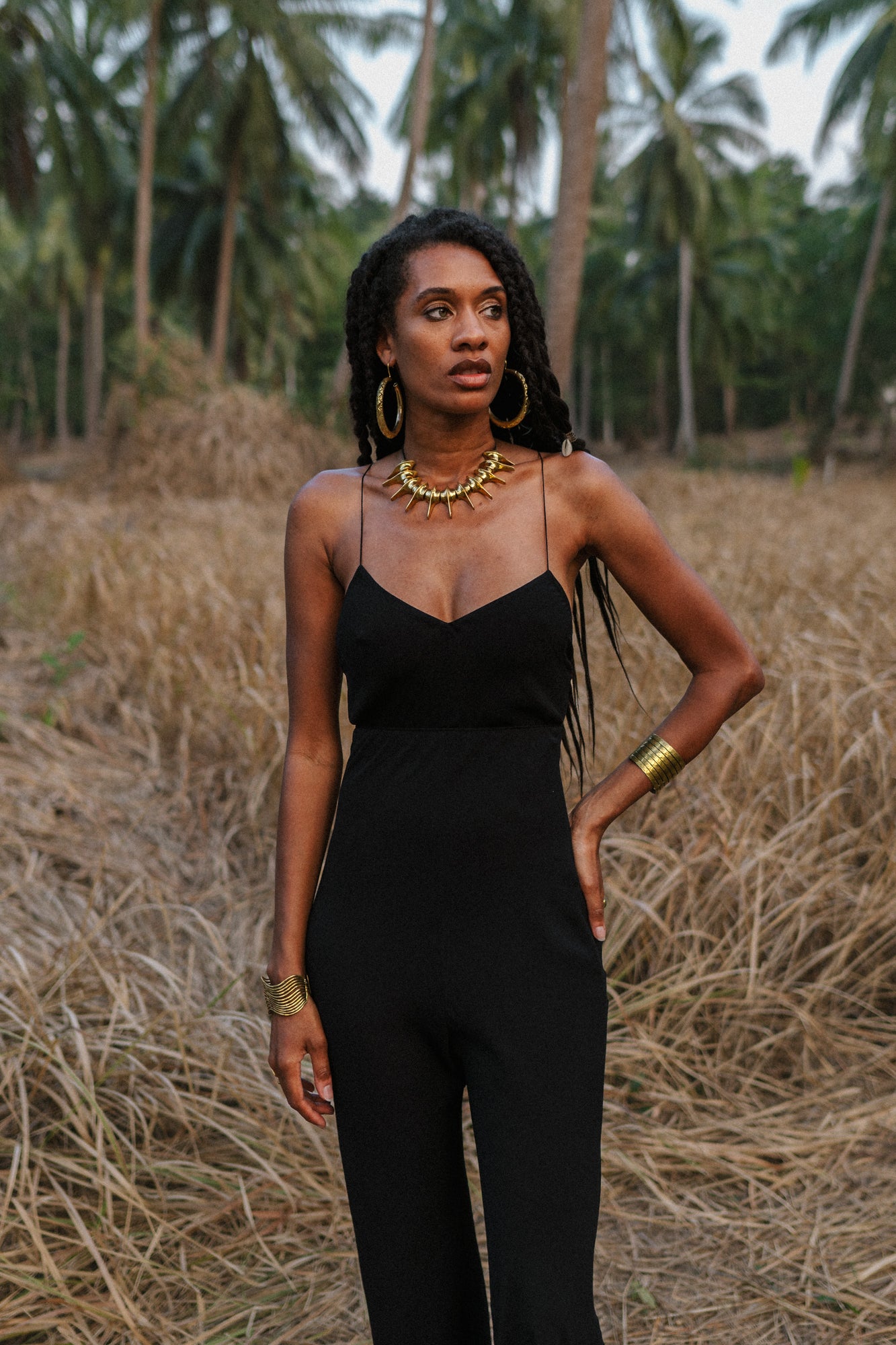Women black jumpsuit with open back