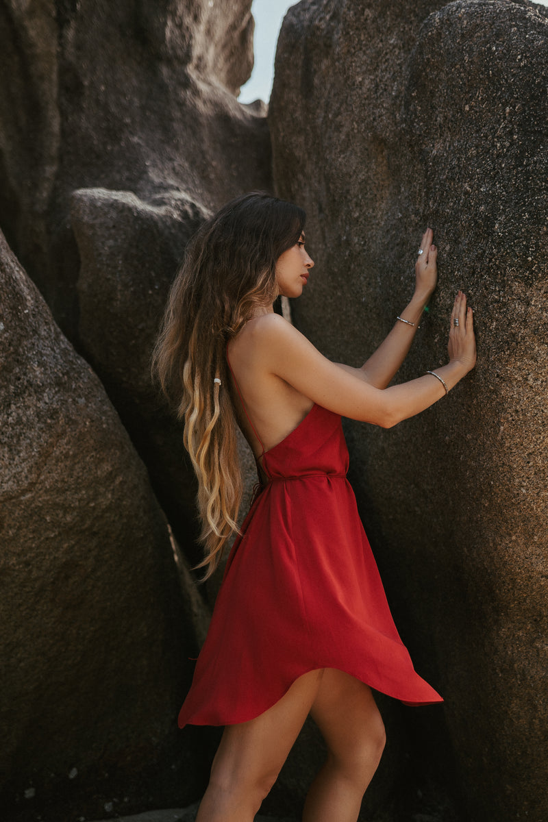 Red mini slip dress with open back