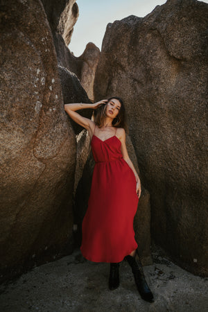 Red midi slip dress with open back