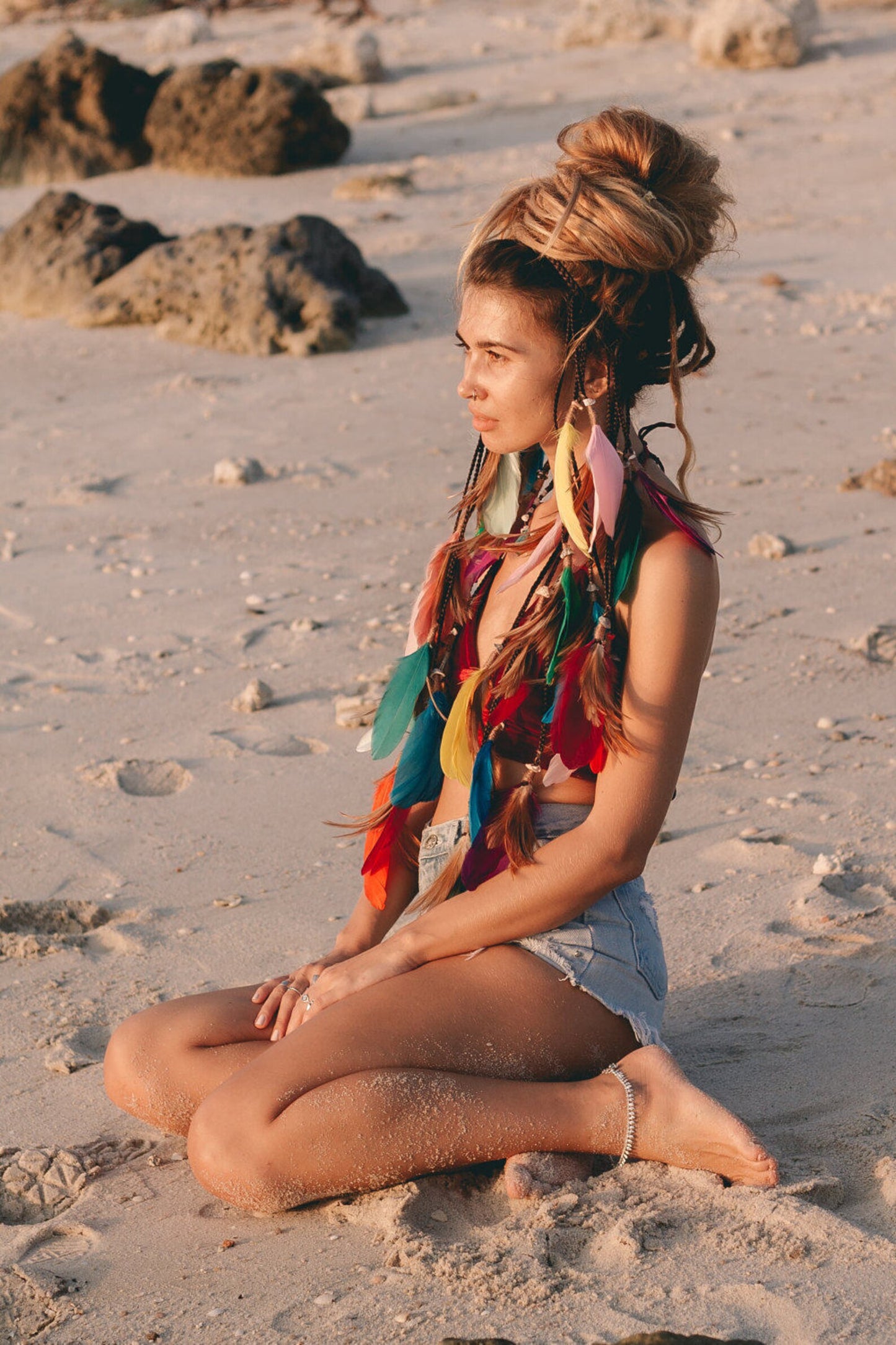 Multi colored headpiece with feathers