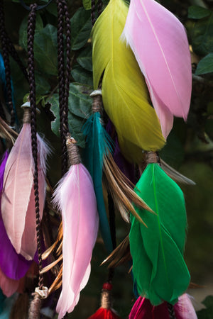 Multi colored headpiece with feathers