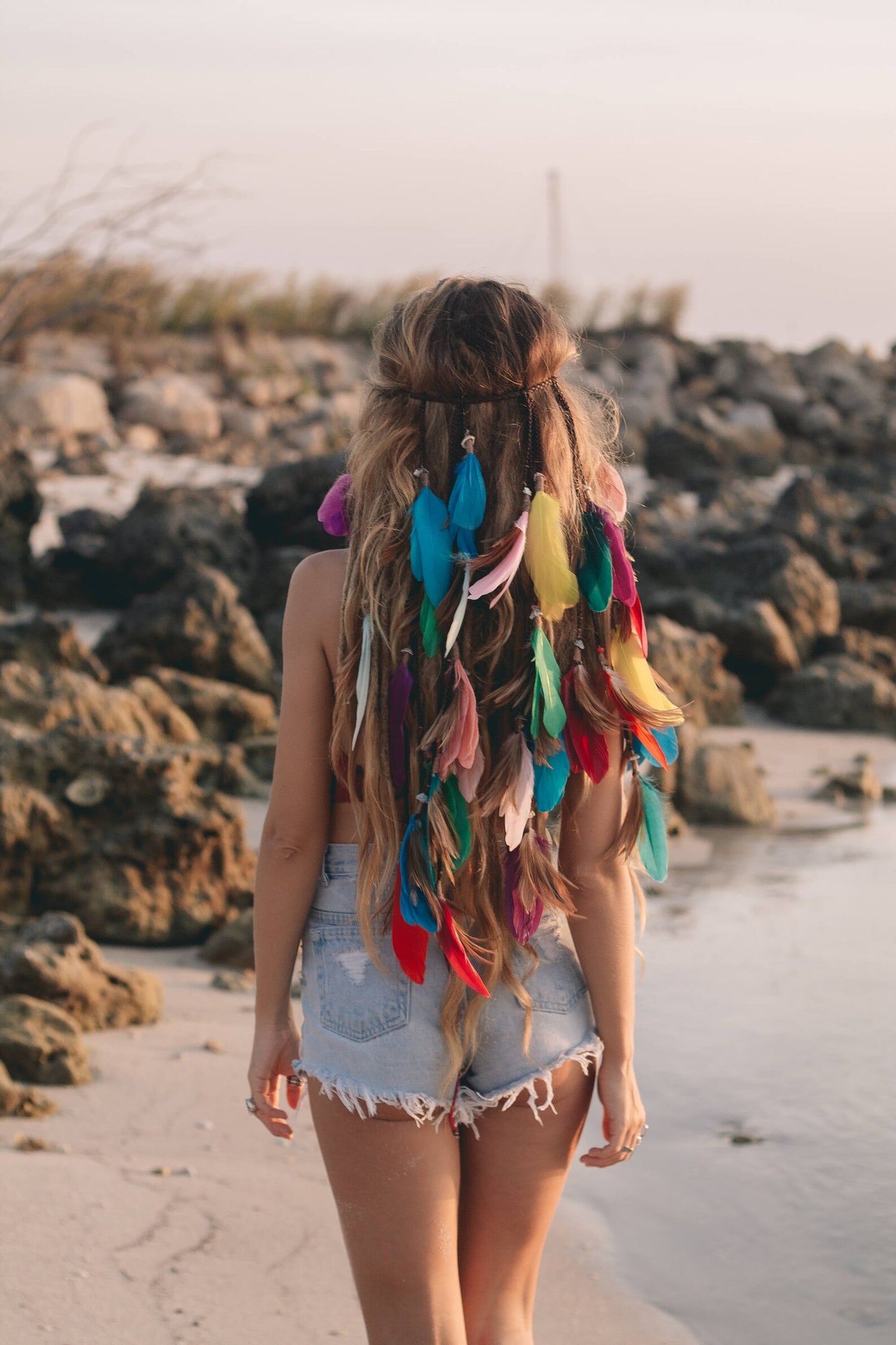 Multi colored headpiece with feathers