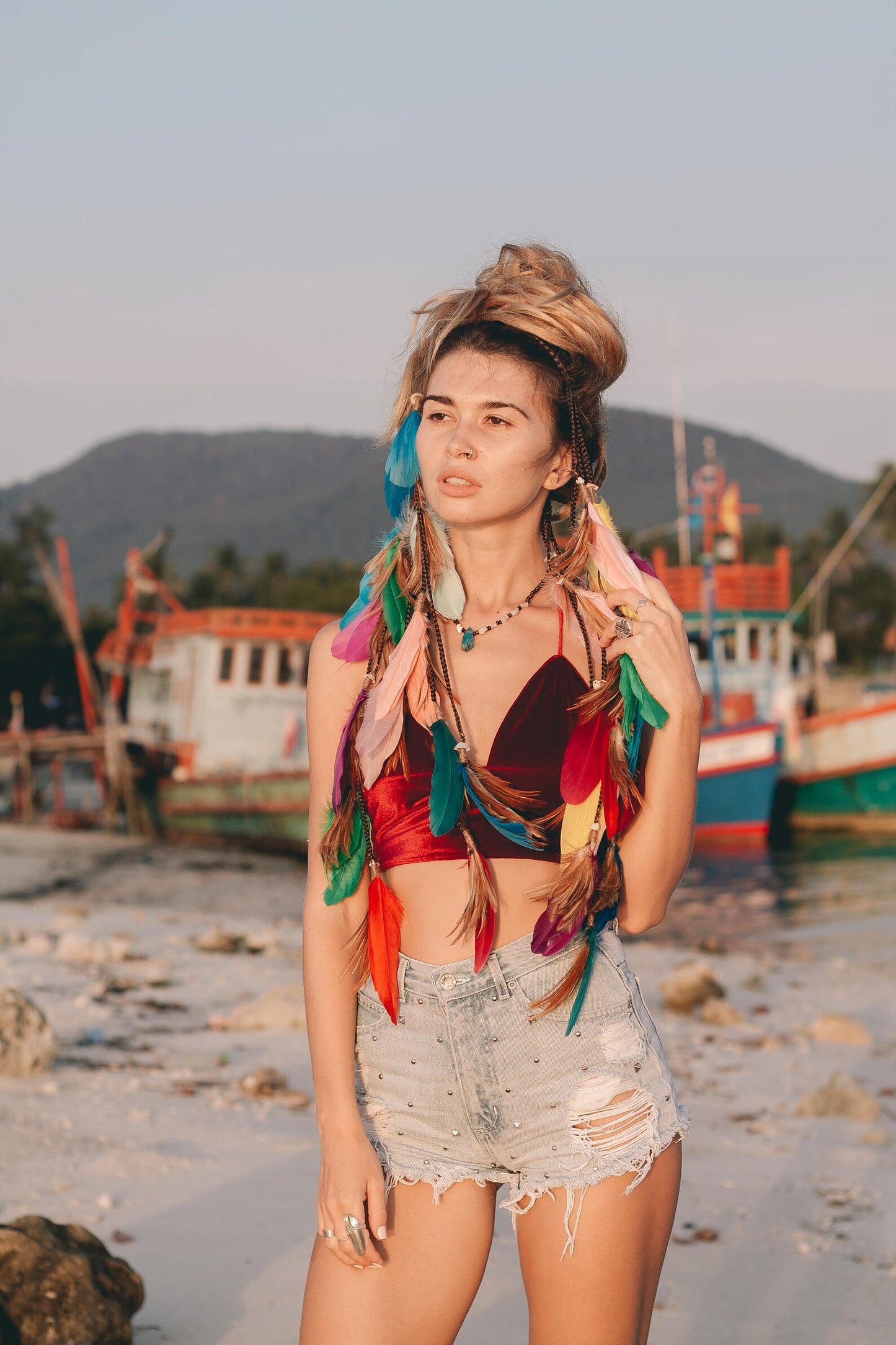 Multi colored headpiece with feathers