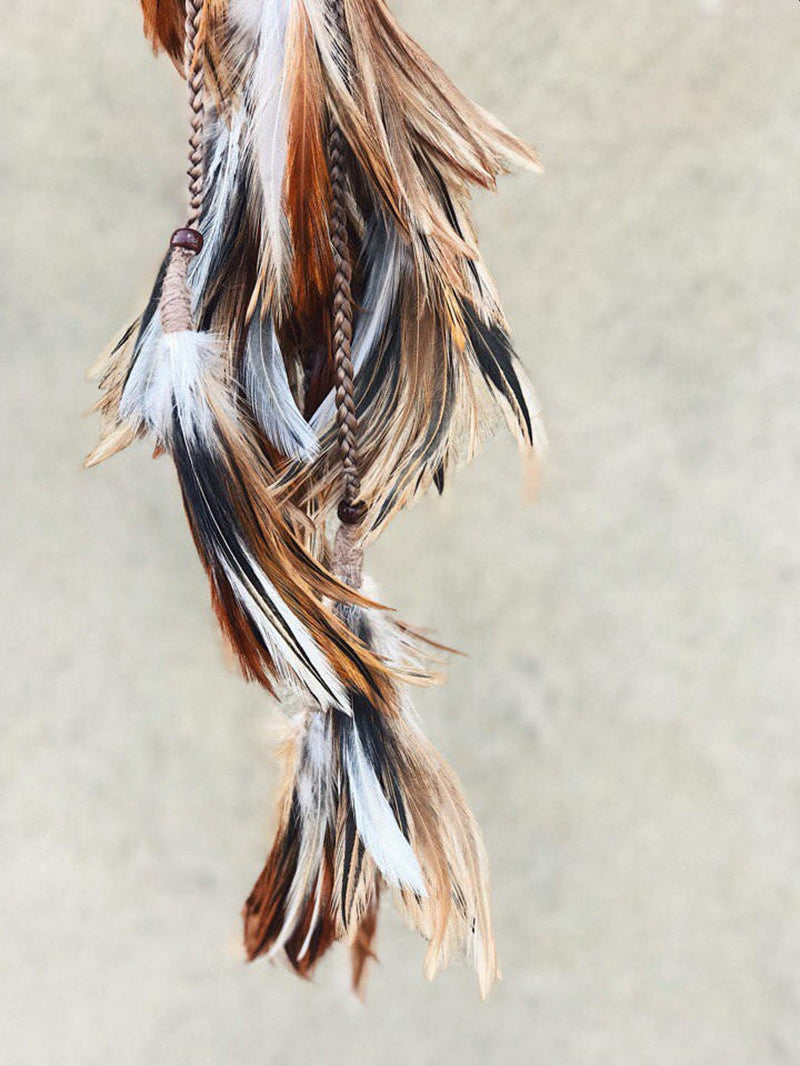 Natural headpiece with feathers