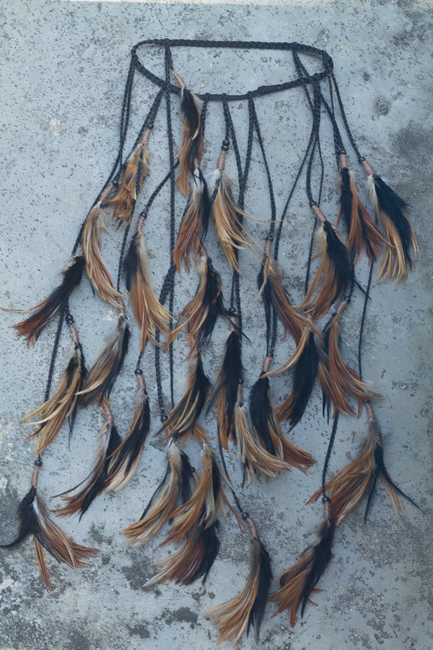 Black headpiece with soft feathers
