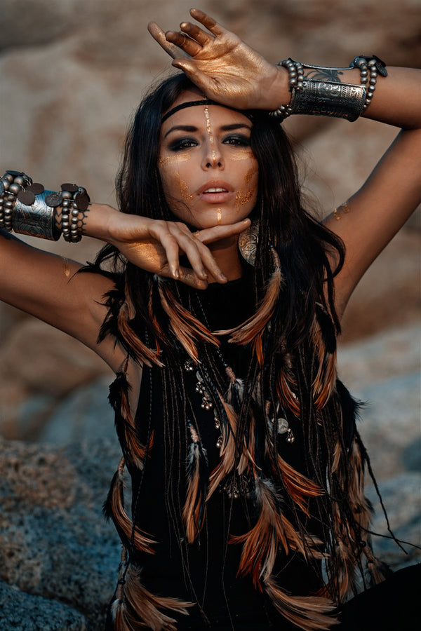 Black headpiece with feathers and added dreadlocks