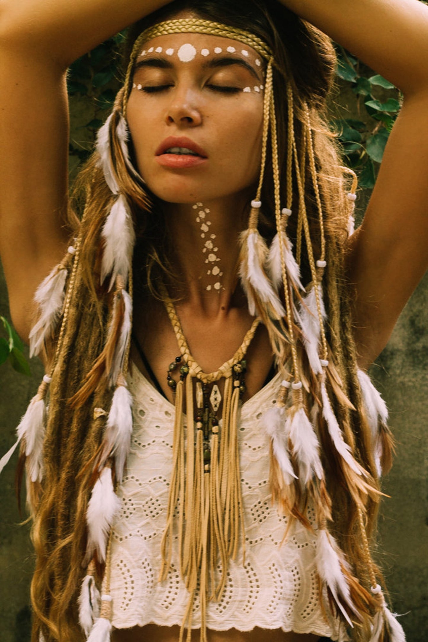 White headpiece with soft feathers