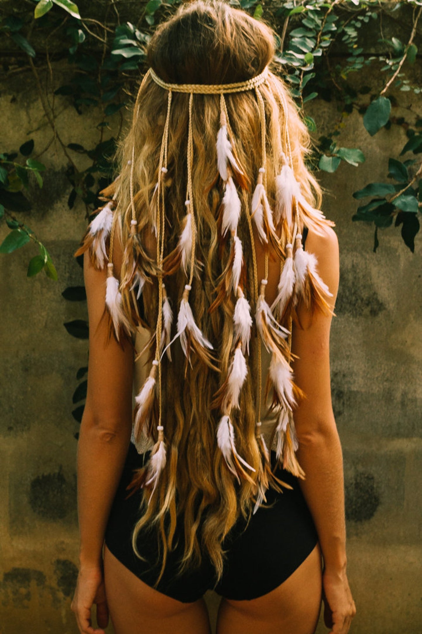 White headpiece with soft feathers